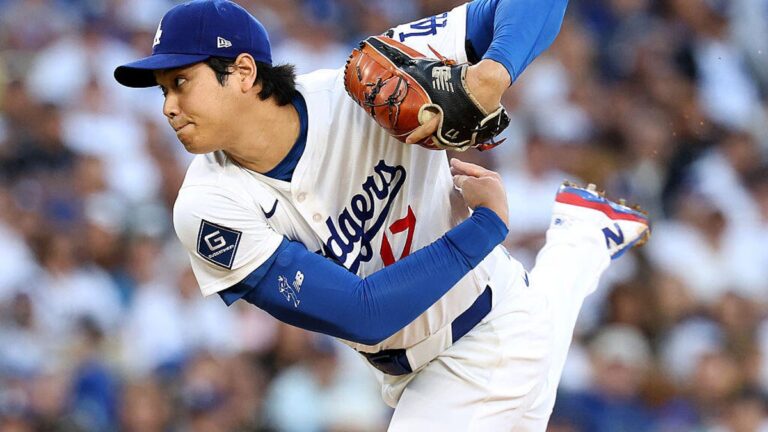 Shohei Ohtani #17 of the Los Angeles Dodgers pitches during the fourth inning against the Milwaukee Brewers in game four of the National League Championship Series at Dodger Stadium